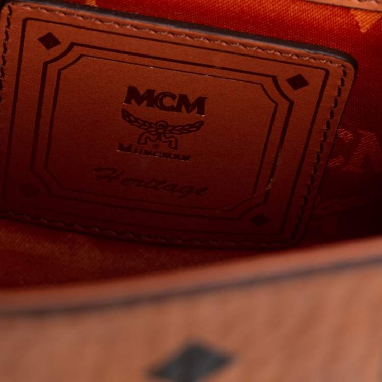 Pre Owned MCM Brown Visetos Coated Canvas and Leather Embellished Mini Heritage Top Handle Bag