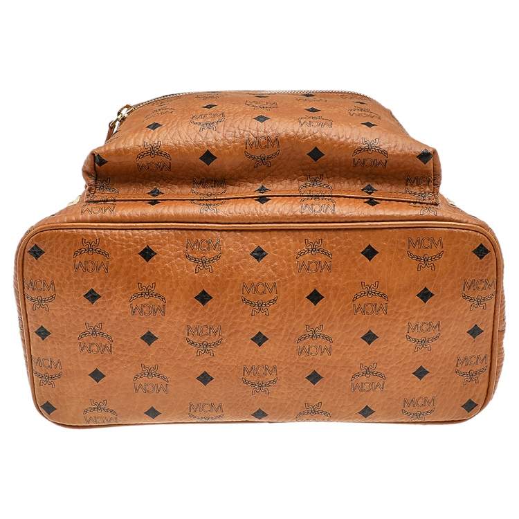 Pre Owned MCM Tan Coated Canvas And Leather Studded Stark Backpack