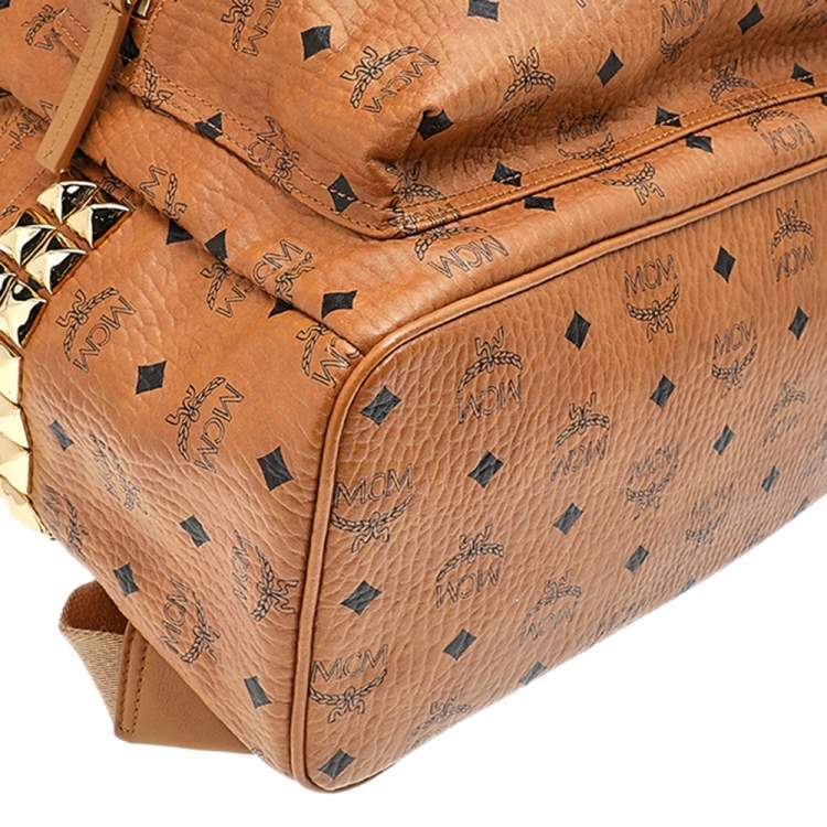 Pre Owned MCM Tan Coated Canvas And Leather Studded Stark Backpack