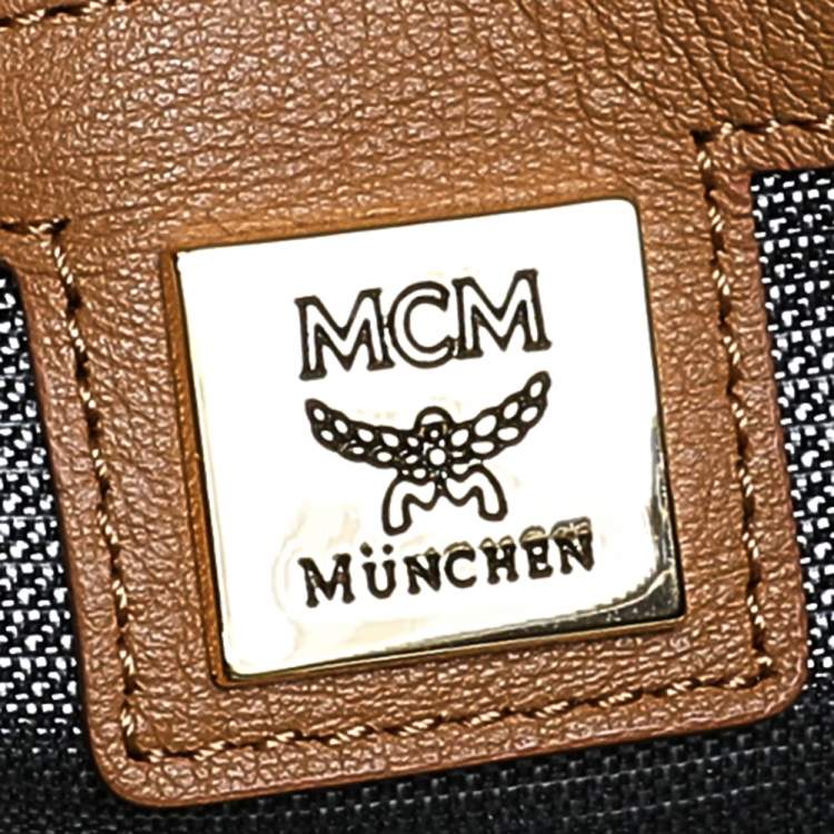Pre Owned MCM Tan Coated Canvas And Leather Studded Stark Backpack