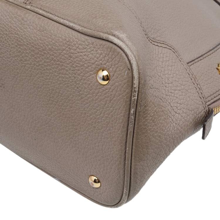 Pre Owned MCM Beige Leather Studded Alma Top Handle Dome Bag
