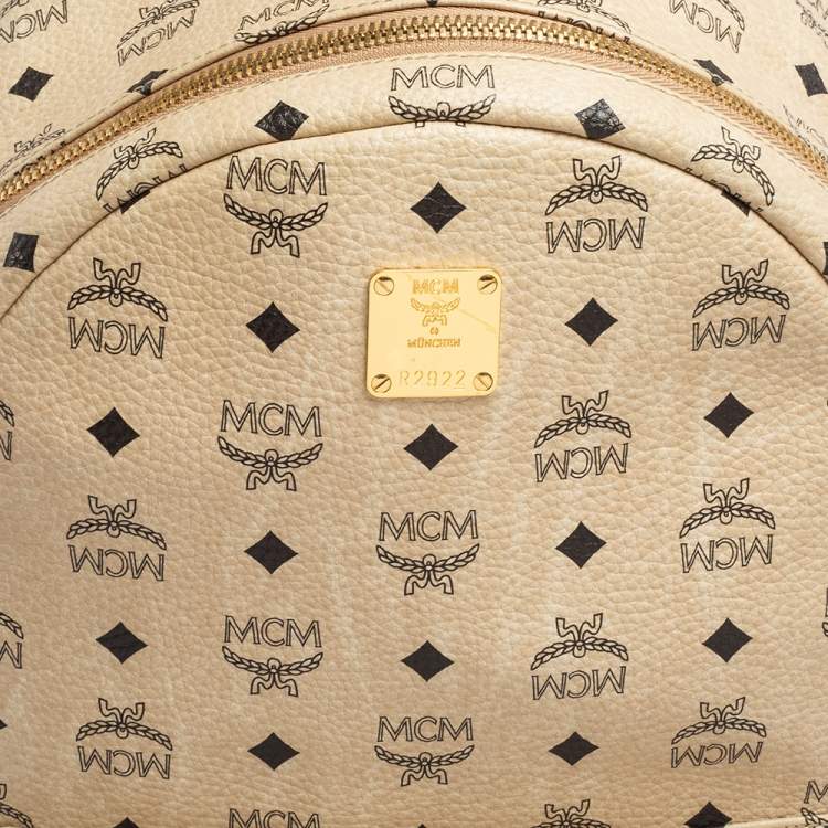 Pre Owned MCM Light Beige Visetos Coated Canvas And Leather Studded Stark Backpack