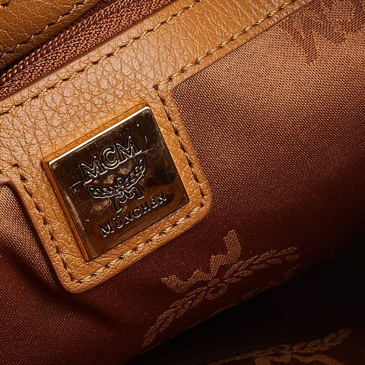 Pre Owned MCM Cognac Visetos Coated Canvas Small Studs Stark Backpack