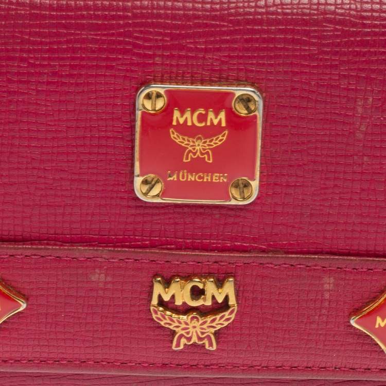 Pre Owned MCM Pink Leather Studded Charm Trifold Wallet