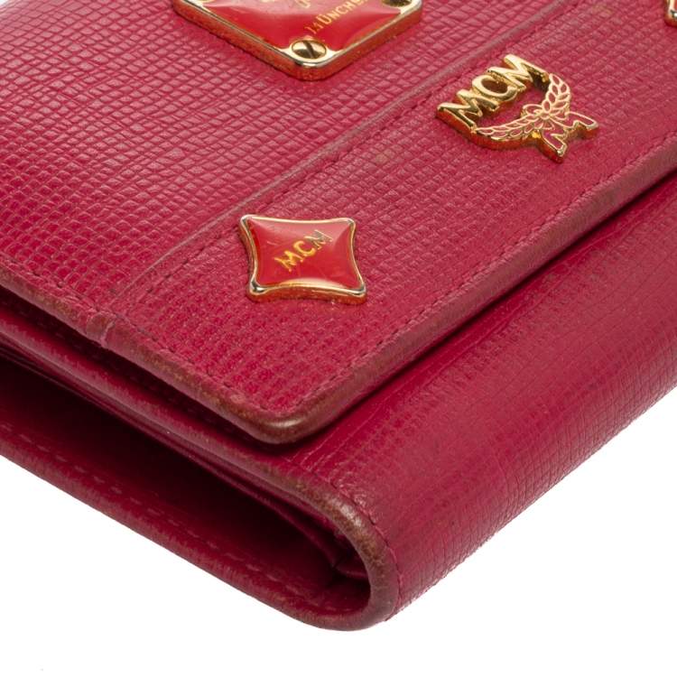 Pre Owned MCM Pink Leather Studded Charm Trifold Wallet