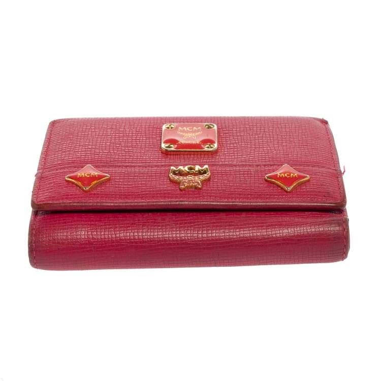 Pre Owned MCM Pink Leather Studded Charm Trifold Wallet