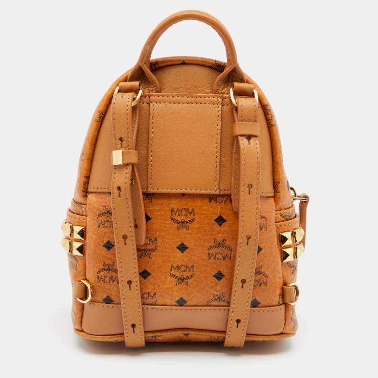 Pre Owned MCM Tan Coated Canvas And Leather Studded Stark Backpack