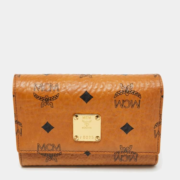 AUTH MCM hotsell SIGNATURE LOGO VISETOS LEATHER COGNAC TRIFOLD WALLET WITH DUST BAG