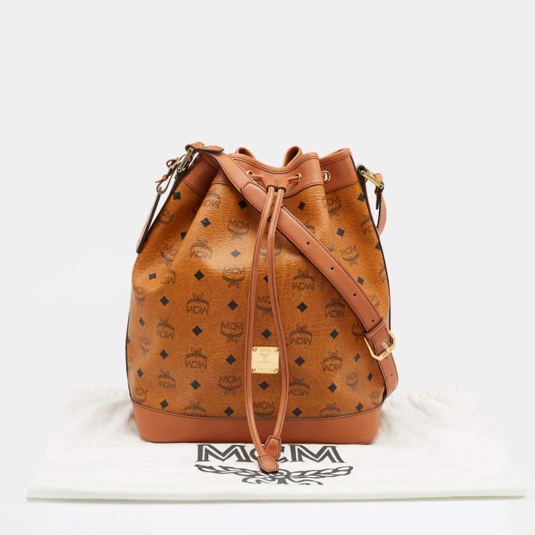 Pre Owned MCM Cognac Visetos Coated Canvas and Leather Heritage Drawstring Bucket Bag