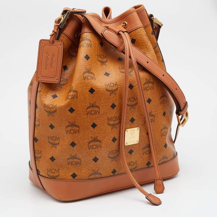 Pre Owned MCM Cognac Visetos Coated Canvas and Leather Heritage Drawstring Bucket Bag