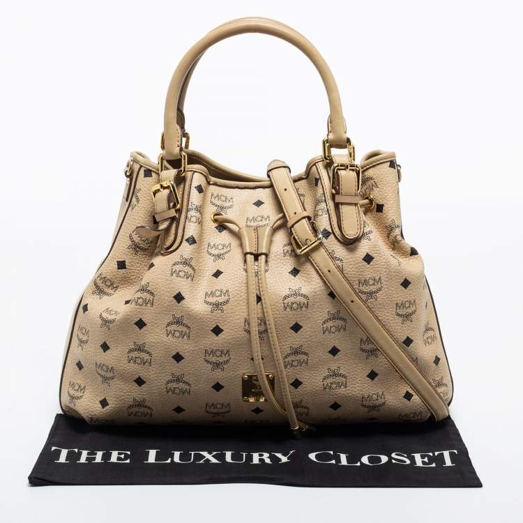 مملوكة مسبقًا MCM Beige Visetos Coated Canvas and Leather Drawstring Tote
