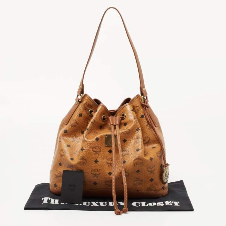 Pre Owned MCM Cognac Visetos Coated Canvas and Leather Heritage Drawstring Bucket Bag