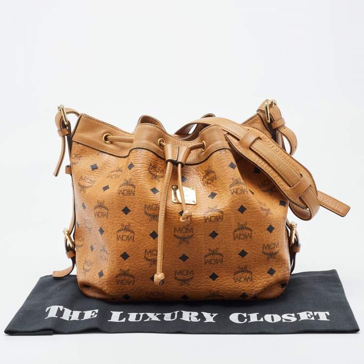 Pre Owned MCM Brown Visetos Coated Canvas and Leather Drawstring Bucket Bag
