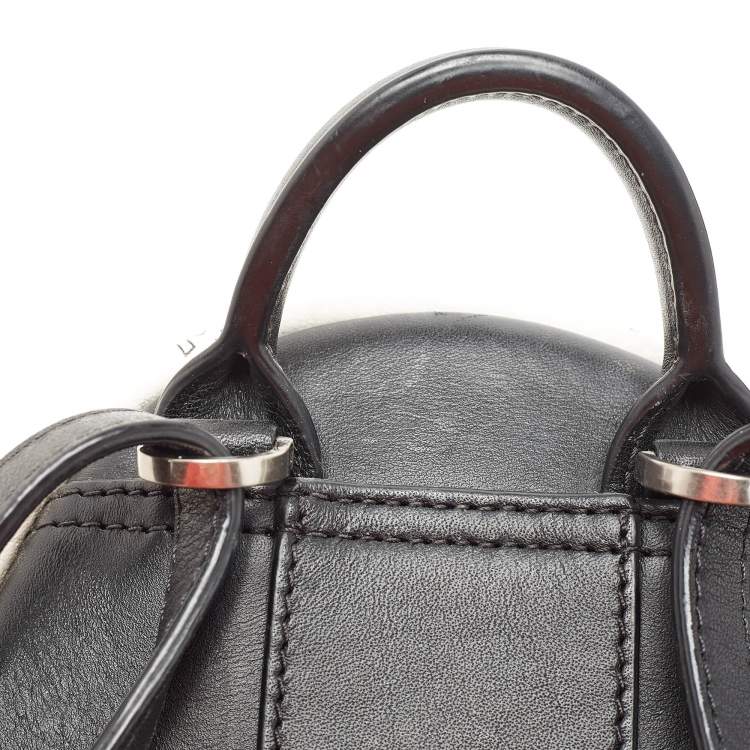 Pre Owned MCM White/Black Visetos Coated Canvas And Leather Mini Stark-Bebe Boo Backpack
