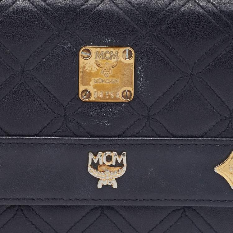 Pre Owned MCM Black Quilted Leather Embellished Flap Compact Wallet