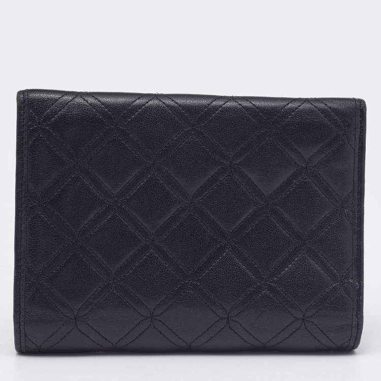 Pre Owned MCM Black Quilted Leather Embellished Flap Compact Wallet