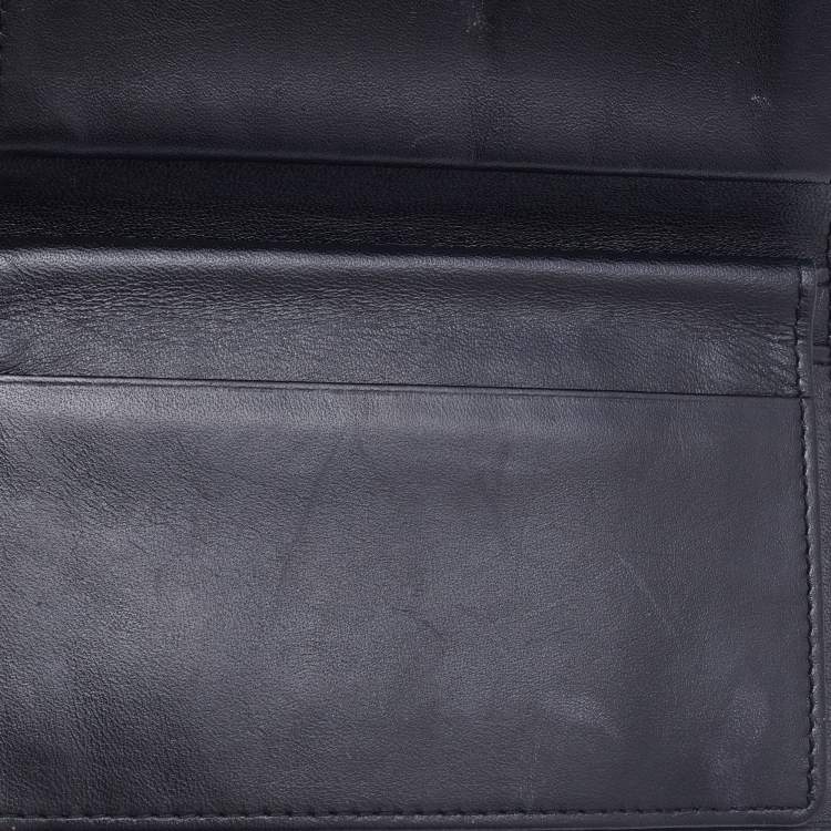 Pre Owned MCM Black Quilted Leather Embellished Flap Compact Wallet