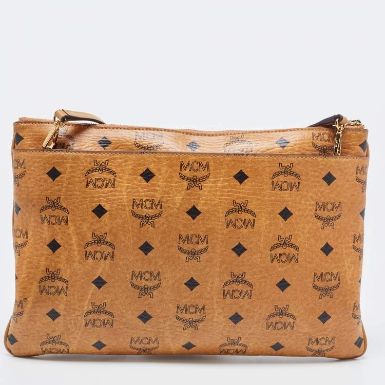 Pre Owned MCM Cognac Visetos Coated Canvas Zip Top Strap Pouch