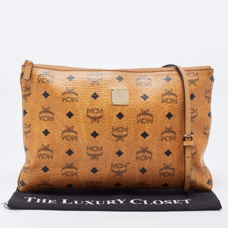 Pre Owned MCM Cognac Visetos Coated Canvas Zip Top Strap Pouch