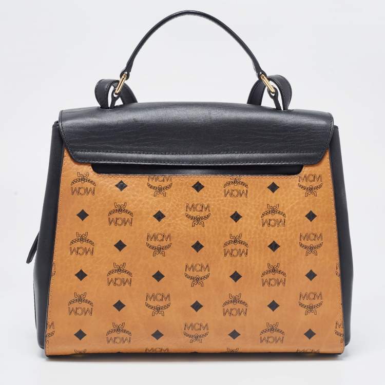 Pre Owned MCM Black/Cognac Visetos Leather Top Handle Bag
