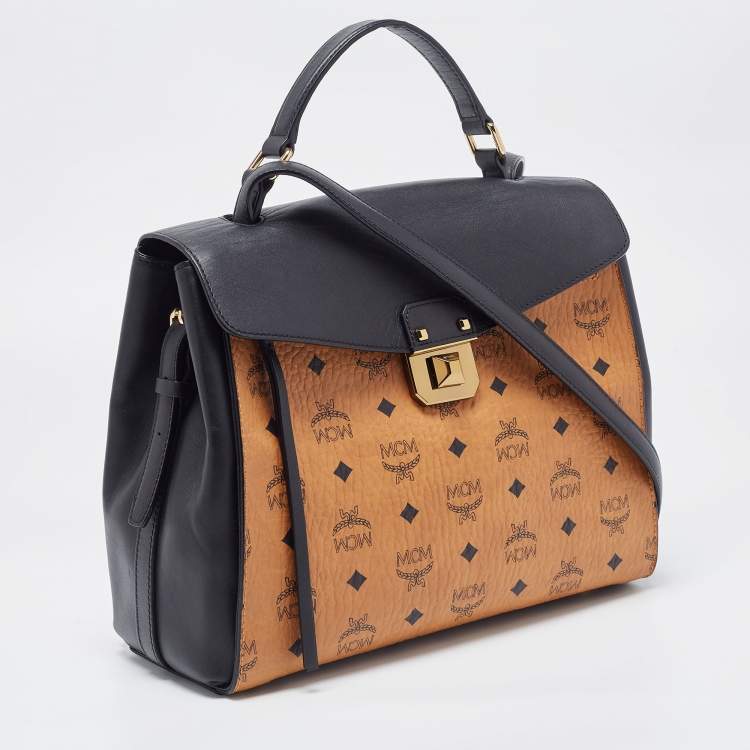 Pre Owned MCM Black/Cognac Visetos Leather Top Handle Bag