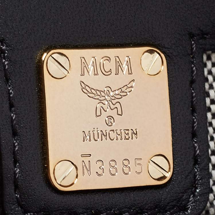 Pre Owned MCM Black/Cognac Visetos Leather Top Handle Bag