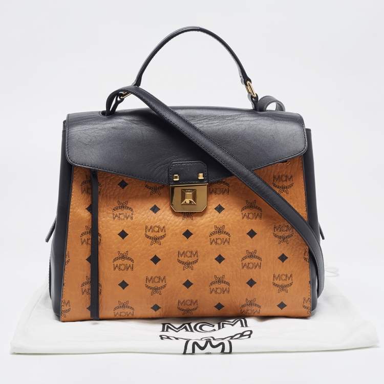 Pre Owned MCM Black/Cognac Visetos Leather Top Handle Bag