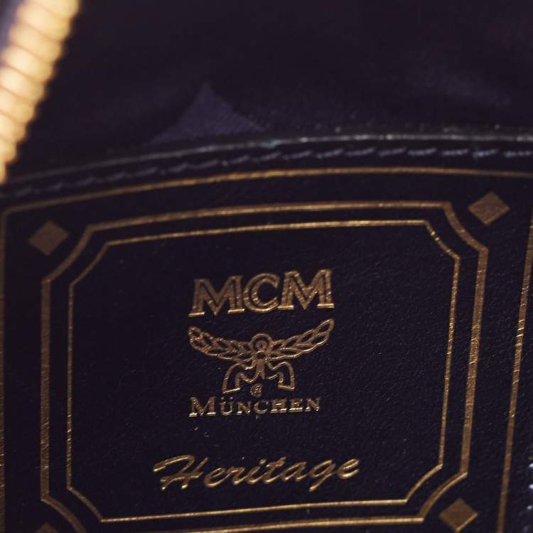 Pre Owned MCM Navy Blue/White Visetos Coated Canvas and Leather Tambourine Round Bag