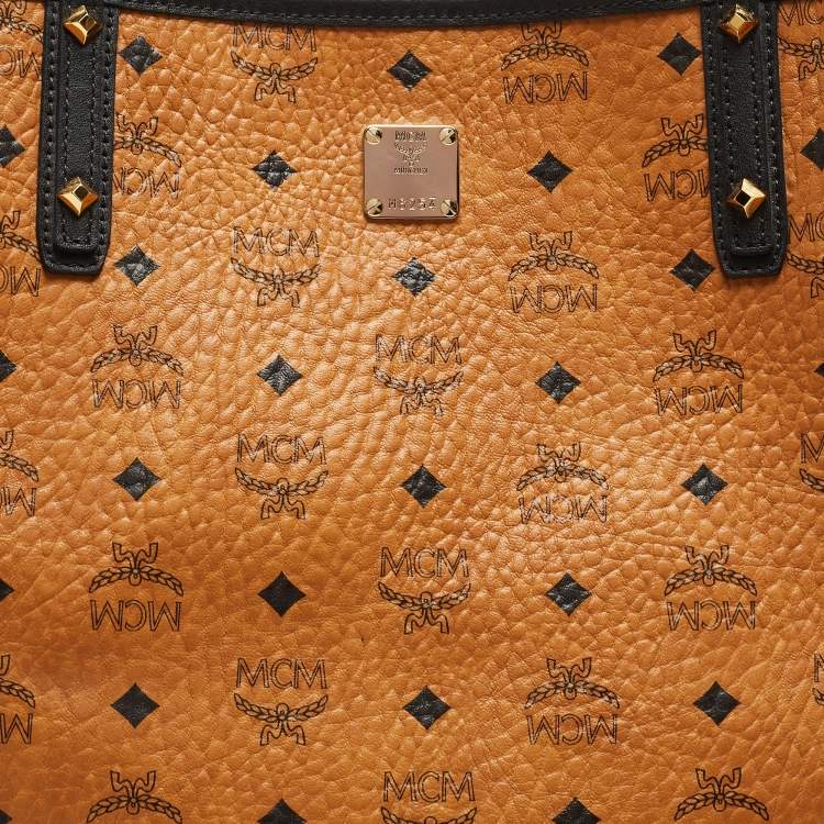 Pre Owned MCM Cognac/Red Visetos Coated Canvas, Leather and Fabric Studded Reversible Tote