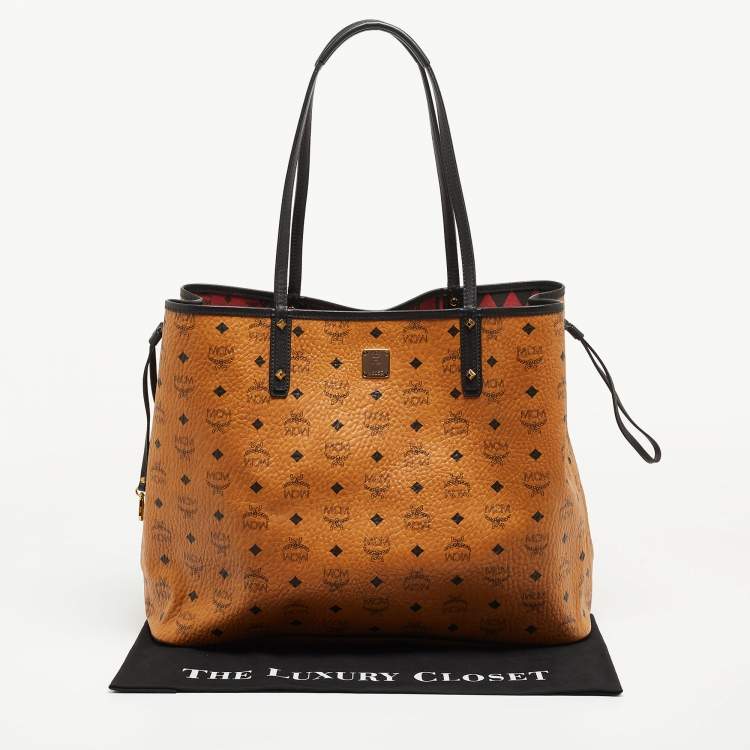 Pre Owned MCM Cognac/Red Visetos Coated Canvas, Leather and Fabric Studded Reversible Tote