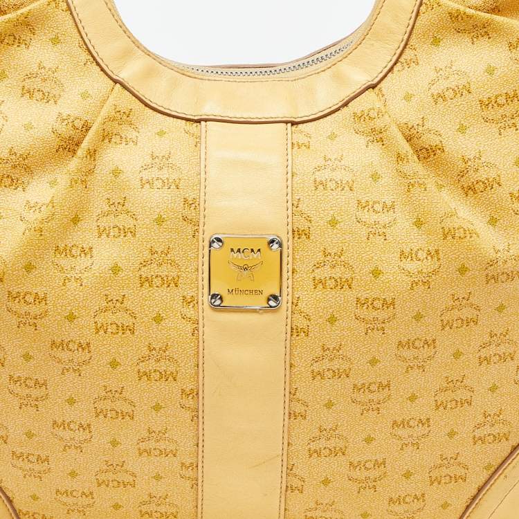 Pre Owned MCM Yellow Visetos Coated Canvas and Leather Hobo