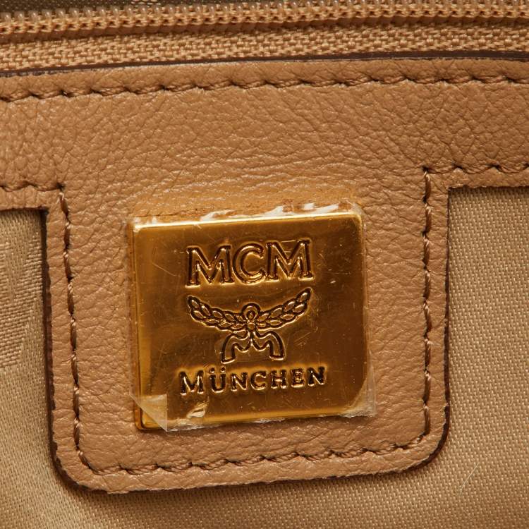 Pre Owned MCM Beige Visetos Coated Canvas and Leather Stark Side Studs Backpack