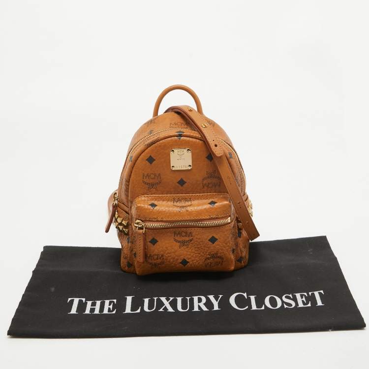 Pre Owned MCM Cognac Visetos Coated Canvas Mini Studded Stark Bebe Boo Backpack