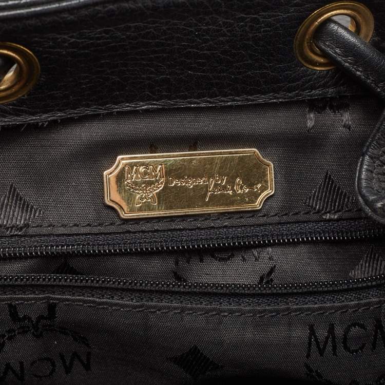 Pre Owned MCM Black Leather Studded Flap Backpack