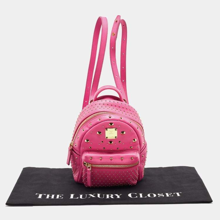 Pre Owned MCM Dark Pink Leather Mini Studded Stark Backpack