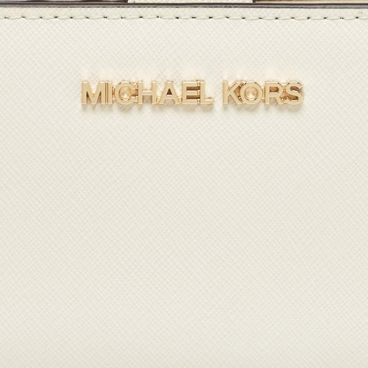 Pre Owned Michael Kors Cream Leather Jet Set Travel Compact Wallet