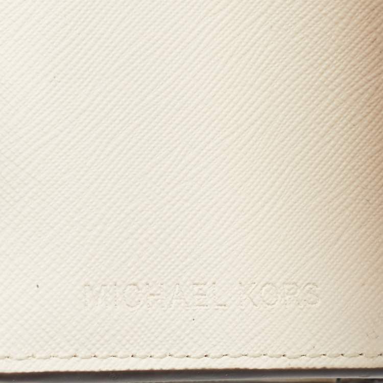 Pre Owned Michael Kors Cream Leather Jet Set Travel Compact Wallet