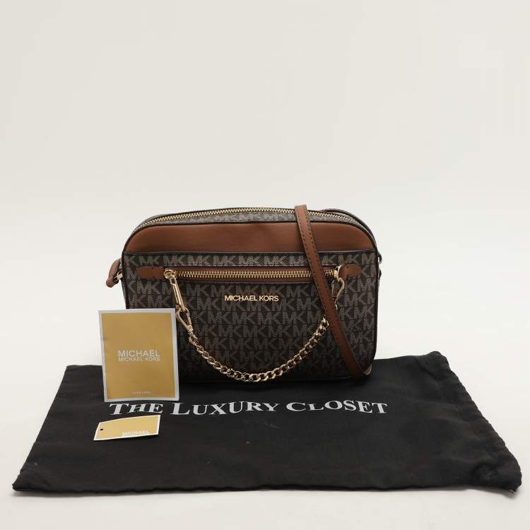 Pre Owned Michael Kors Brown Signature Coated Canvas and Leather Jet Set Crossbody Bag