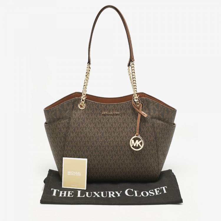 Pre Owned Michael Kors Brown Signature Coated Canvas Large Jet Set Travel Chain Tote