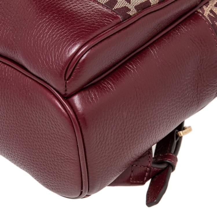 مملوكة مسبقًا Michael Kors Burgundy Canvas And Leather Abbey Backpack