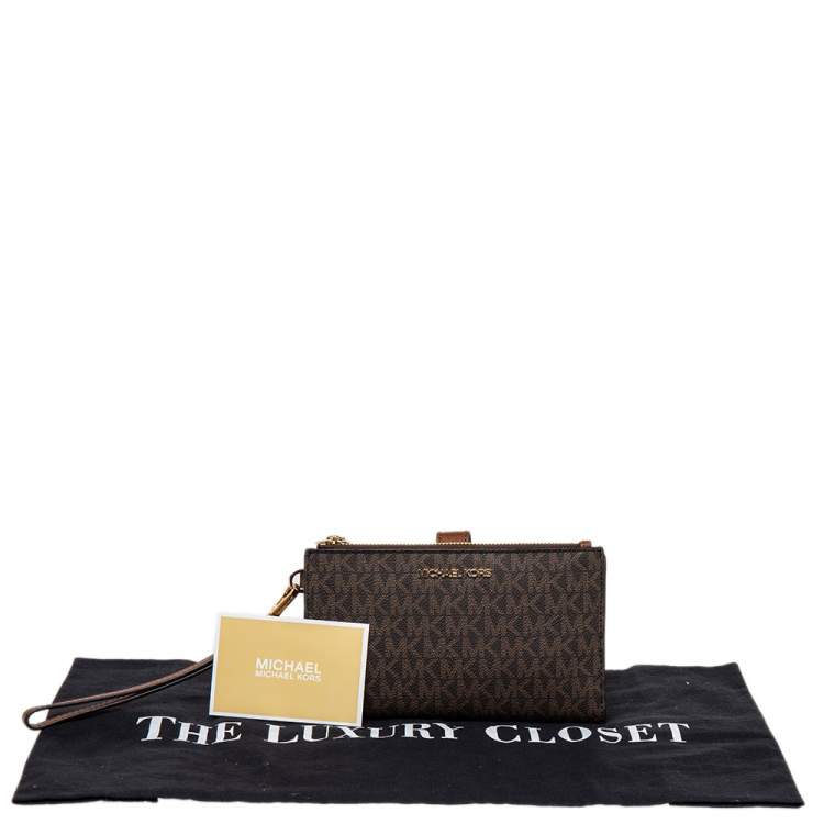 Pre Owned Michael Kors Brown Coated Canvas Jet Set Travel Double Zip Wristlet Wallet