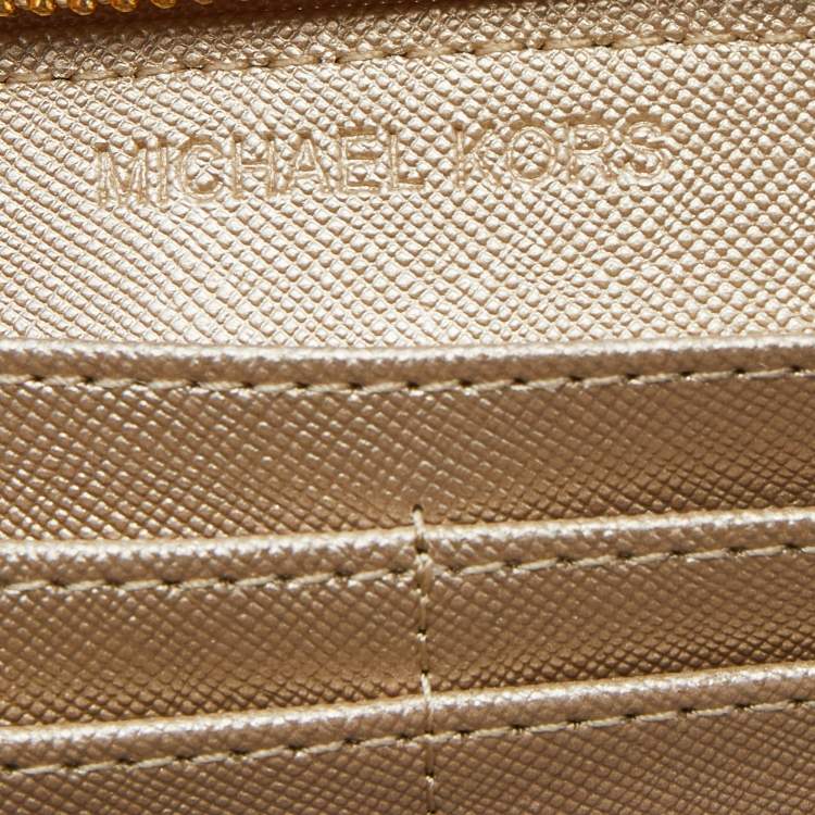Pre Owned Michael Kors Gold Leather Jet Set Zip Around Wallet