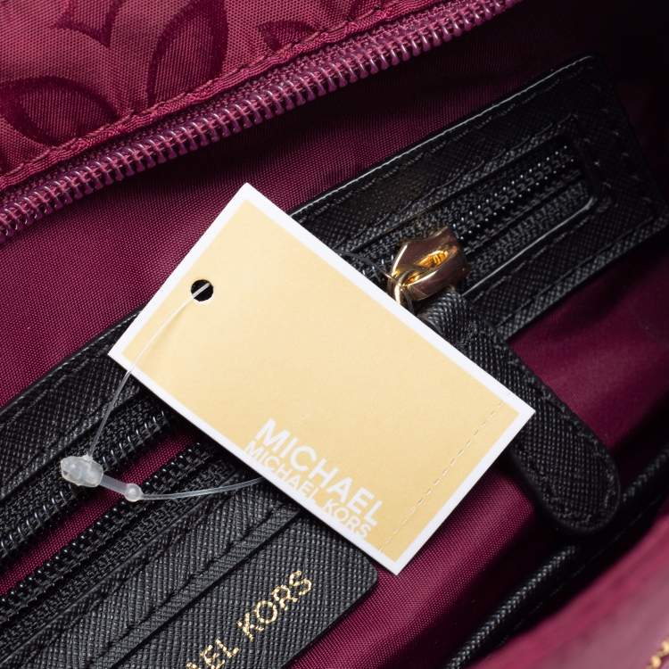 Pre Owned Michael Kors Plum Floral Nylon Large Kelsey Messenger Bag 