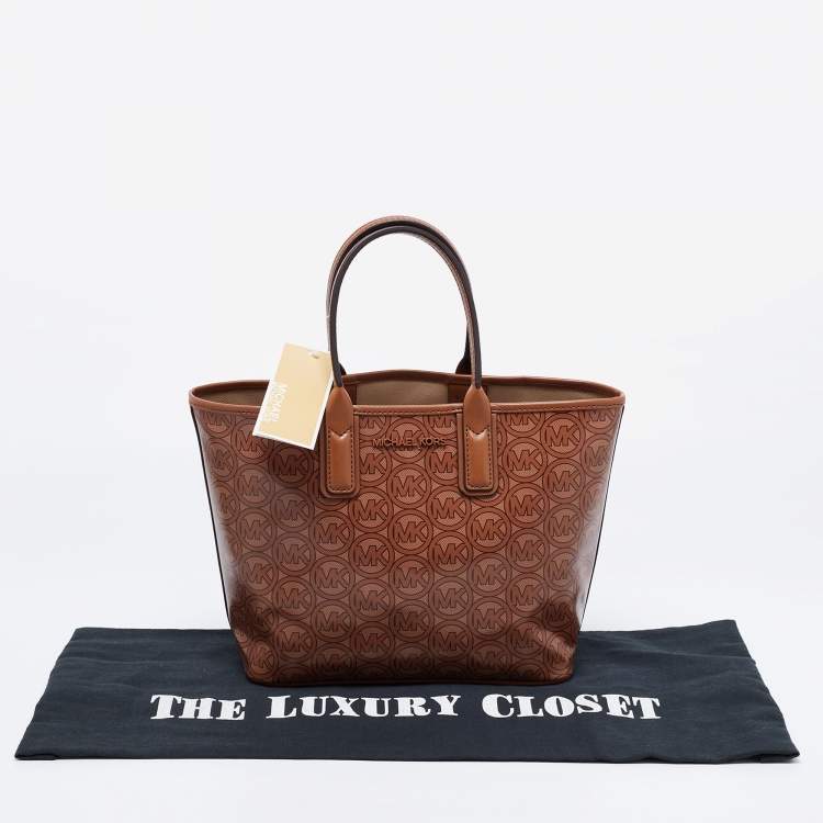 Pre Owned Michael Kors Brown Signature Coated Canvas and Leather Jodie Tote