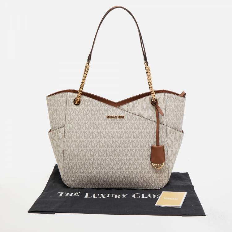 Pre Owned Michael Kors Off White Signature Coated Canvas Large Jet Set Chain Tote