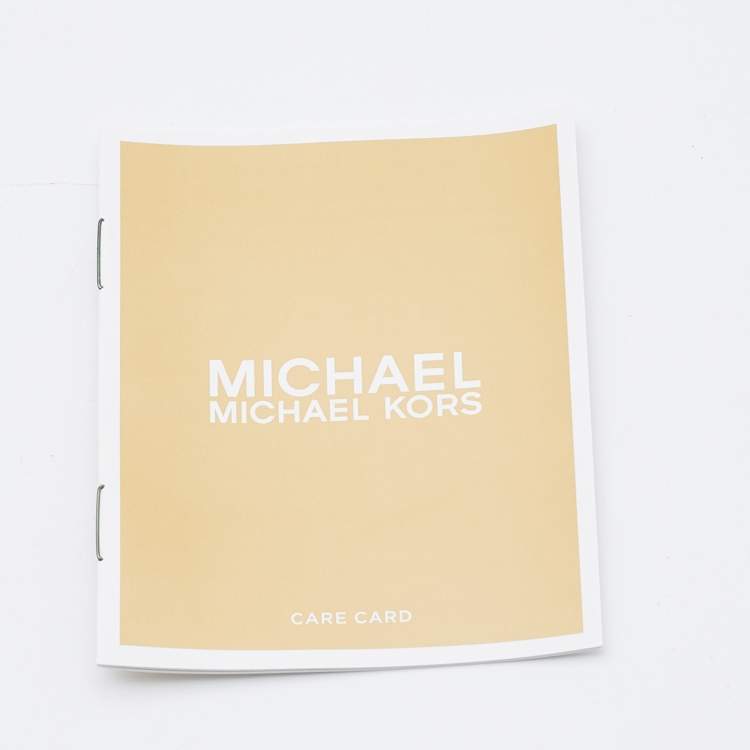 Pre Owned Michael Kors Gold Floral Embossed Leather Karla Clutch Bag