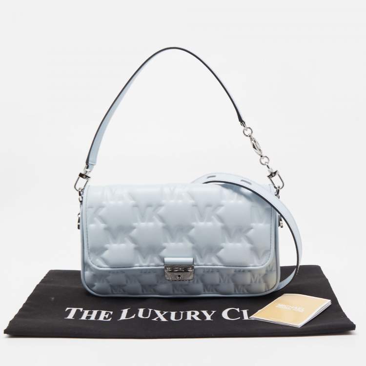 Pre Owned Michael Kors Sky Blue Signature Embossed Leather Bradshaw Convertible Shoulder Bag