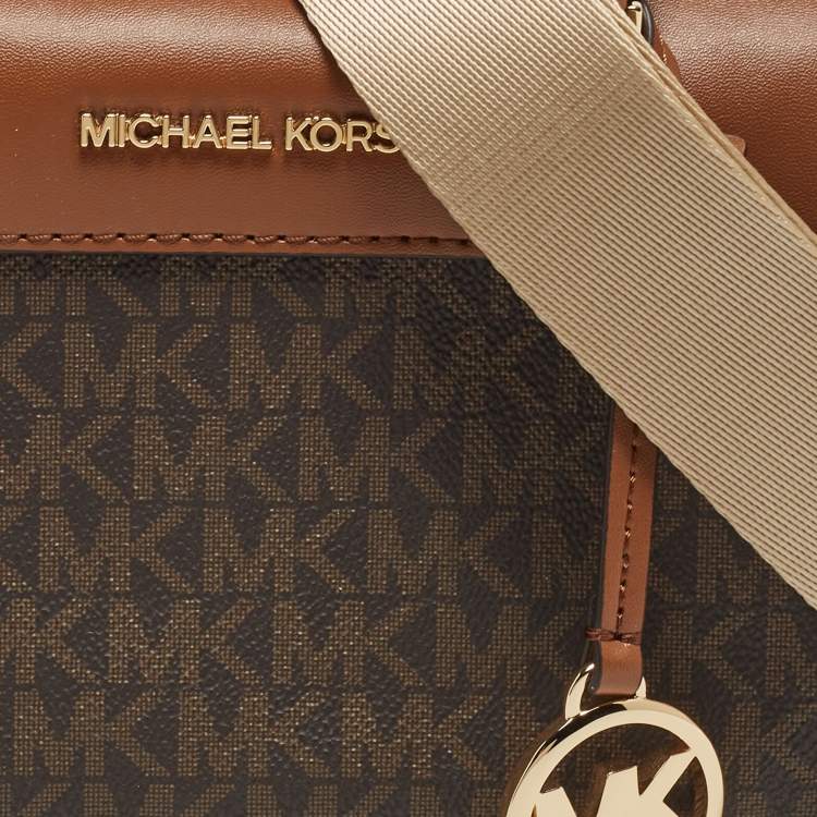 Pre Owned Michael Kors Brown Signature Canvas And Leather Extra Small Duffle Bag