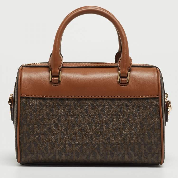 Pre Owned Michael Kors Brown Signature Canvas And Leather Extra Small Duffle Bag