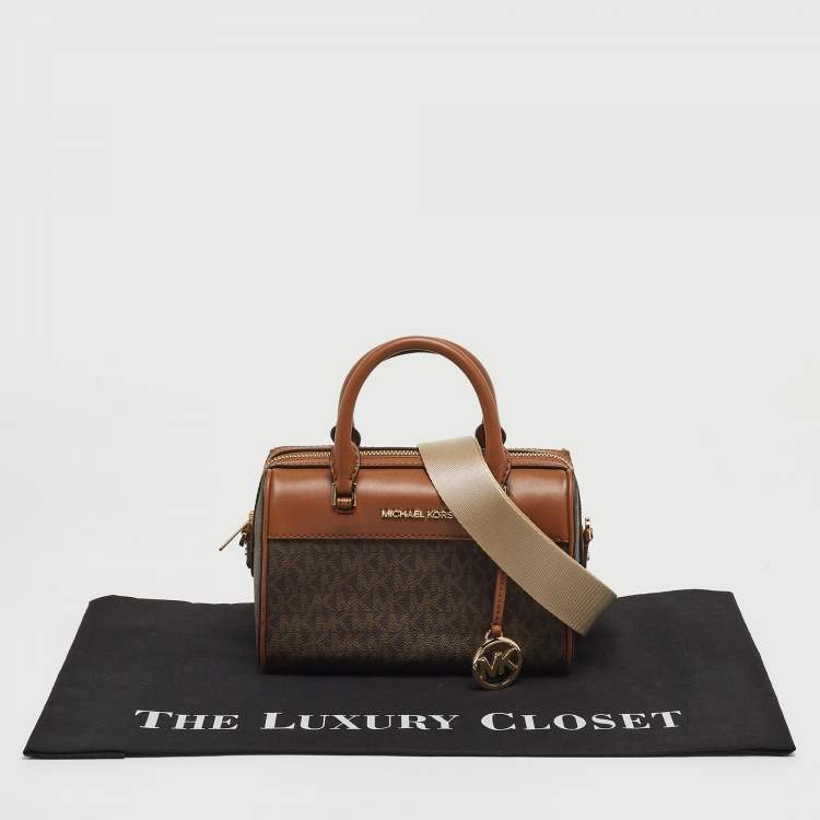 Pre Owned Michael Kors Brown Signature Canvas And Leather Extra Small Duffle Bag